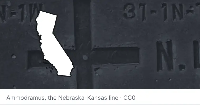 A survey monument's crosshair, under the outline of California. The source names the Nebraska-Kansas line.