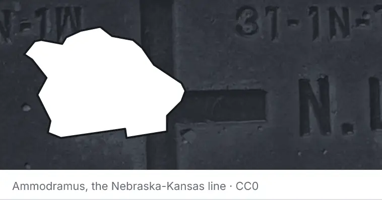 A survey monument's crosshair, under the outline of Citrus County. The source names the Nebraska-Kansas line.