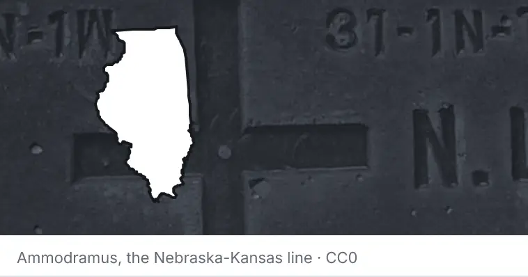 A survey monument's crosshair, under the outline of Illinois. The source names the Nebraska-Kansas line.