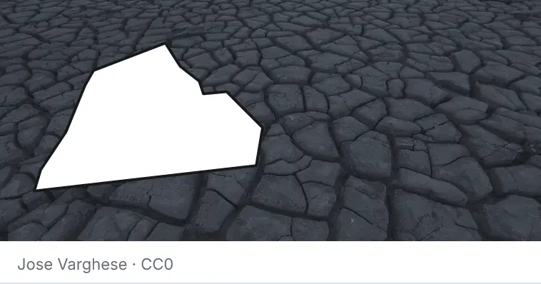 Dried, cracked ground, under the outline of Catawba County.