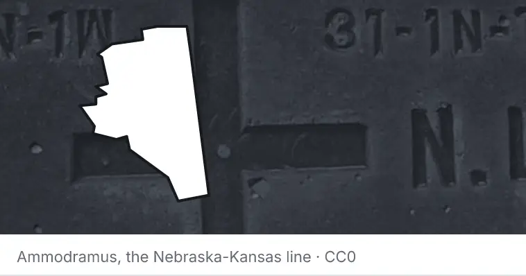 A survey monument's crosshair, under the outline of Davidson County. The source names the Nebraska-Kansas line.