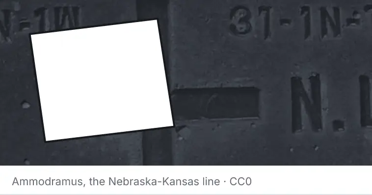 A survey monument's crosshair, under the outline of Guilford County. The source names the Nebraska-Kansas line.