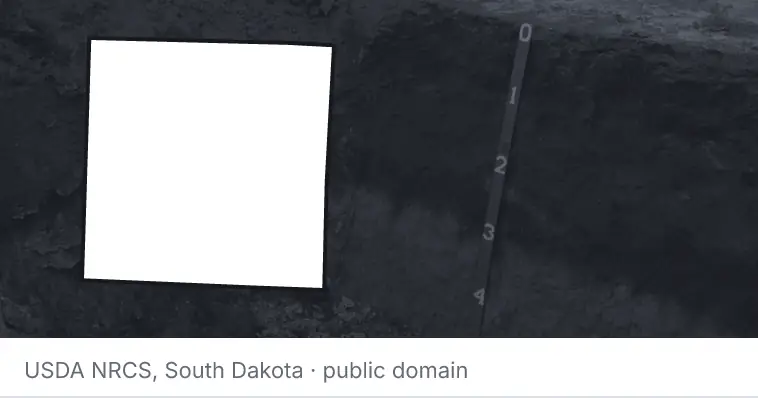 A soil profile in an open pit, under the outline of Wise County. The source names South Dakota.