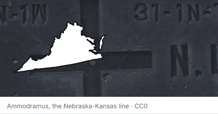 A survey monument's crosshair, under the outline of Virginia. The source names the Nebraska-Kansas line.