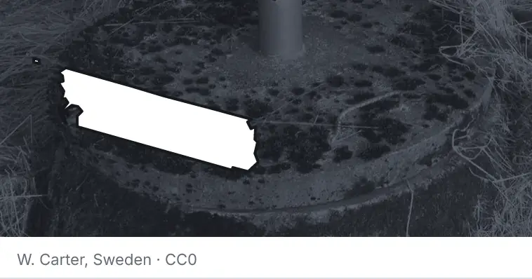 A septic tank access lid and riser, under the outline of Whatcom County. The source names Sweden.